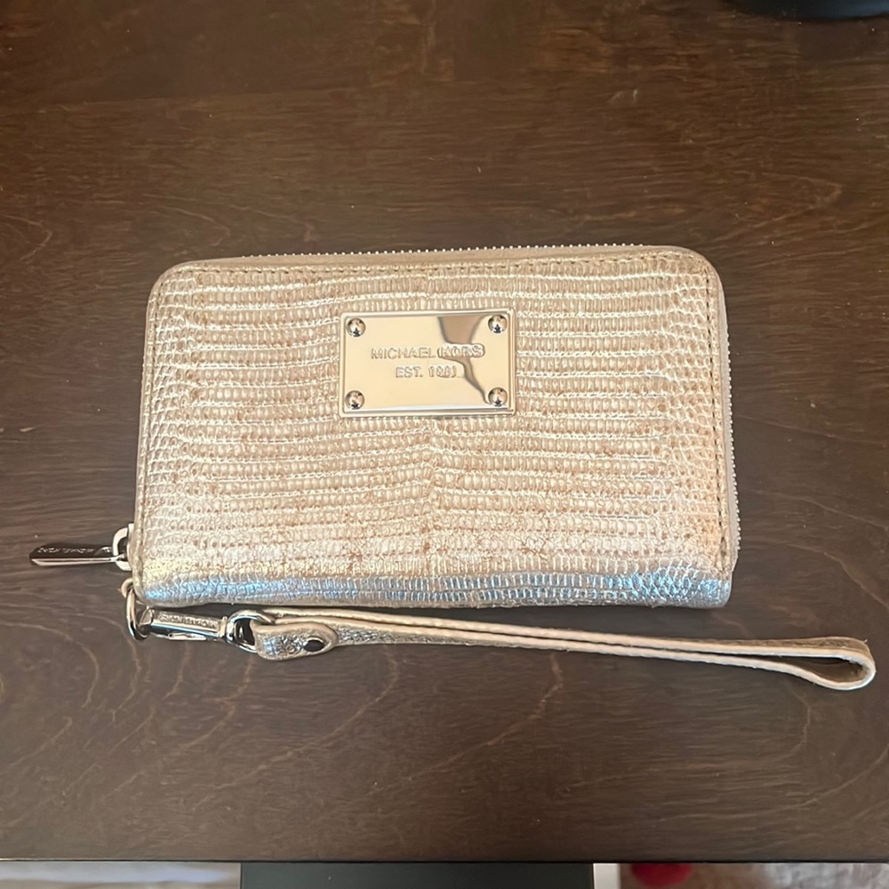 Used Michael Kors phone and card carrying wallet